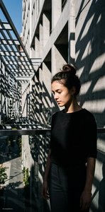 Cinematic Hispanic Woman Urban Portrait Shadows